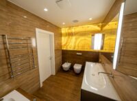 Luxury bathroom vanity. High angle view of the luxury bathroom with wooden walls