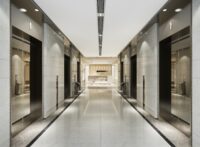 modern steel elevator lift lobby in business hotel with luxury design near corridor